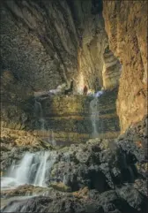 ?? PROVIDED TO CHINA DAILY ?? An undergroun­d river deep inside Guanyin Cave has become an attraction.