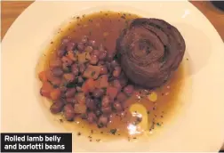  ??  ?? Rolled lamb belly and borlotti beans