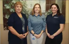  ??  ?? From left to right: Lead lymphedema therapist Marion Cella-Ries, PT, CLT; Carrie Leese, DPT, CLT; and Gina Wells, DPT, CLT.