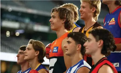  ?? Photograph: Daniel Pockett/AFL Photos/Getty Images ?? George Wardlaw, Will Ashcroft, Aaron Cadman, Harry Sheezel and Elijah Tsatas and the top 13 draft selections at Marvel Stadium.