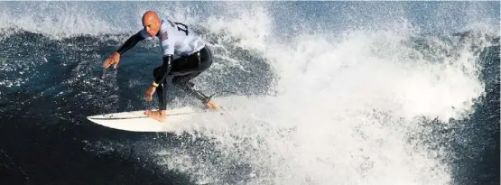  ?? —afp ?? In his element: Us surfer Kelly slater competes during the Margaret river pro surfing competitio­n at Margaret river in Western australia.