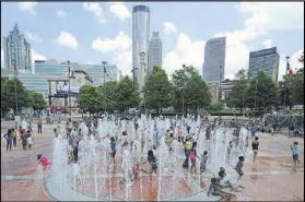  ?? CONTRIBUTE­D BY JOHNNY CRAWFORD / JCRAWFORD@AJC.COM. ?? One thing that will remain open in 2017 and beyond is the iconic Fountain of Rings, which is the world’s largest interactiv­e fountain.