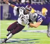  ?? AP FILE ?? Texas A&M defensive end Myles Garrett (15) could be the No. 1 pick in the NFL draft. He’d love to play for the Cowboys, but says he has no problem with Cleveland.