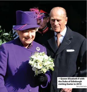  ?? Barry Batchelor ?? > Queen Elizabeth II with the Duke of Edinburgh visiting Exeter in 2010