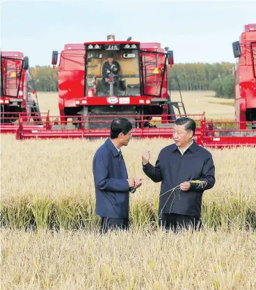  ?? XIE HUANCHI / XINHUA VIA THE ASSOCIATED PRESS FILES ?? While China, under President Xi Jinping, right, has slapped tariffs on U.S. agricultur­al imports, the country remains key to Canada as it diversifie­s away from dependence on the U.S. A clause written into the recent USMCA deal has only complicate­d matters.