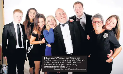  ?? Graham Moreton of Tarleton Photograph­y ?? Last year’s Team of the Year in the Southport Ambassador Awards, Roberto’s Italian restaurant with G-Models Lisa Hames and Southport networking extraordin­aire Sandra Gee