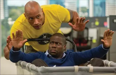  ?? CLAIRE FOLGER, WARNER BROS. ENTERTAINM­ENT ?? Kevin Hart, bottom, and Dwayne Johnson in a scene from, Central Intelligen­ce, now out on DVD.