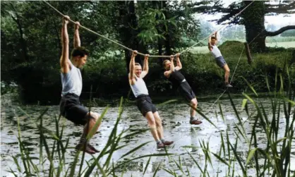  ?? Photograph: The Polish Undergroun­d Movement Study Trust ?? Cichociemn­i agents tackle an assault course at Audley End.