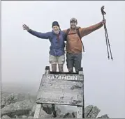  ?? Ben Poston Los Angeles Times ?? SAM AND Ben Poston, right, at Maine’s Mt. Katahdin, the end to their hike of the Appalachia­n Trail.