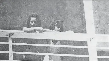  ?? Picture: FILE PHOTO ?? Thelma Miller (left) and Trina Simpson watch from the Oriana as the ship sails into Suva.