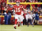  ?? JEFF ROBERSON AP ?? Chiefs quarterbac­k Patrick Mahomes celebrates after throwing one of his five TD passes against the Texans.