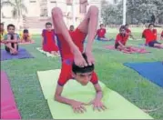  ??  ?? Kendriya Vidyalaya students practising yoga at Dilkusha garden.
