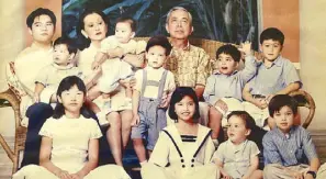  ??  ?? Grandparen­ts and grandchild­ren, 1995. (First row, from left) My nieces Nasha and Nicole with my nephews Ludovic and Dominic; (second row, from left) my nephew Buster holding his brother Alonzo, my mom Helen holding my Matteo, my Quintin with my father...