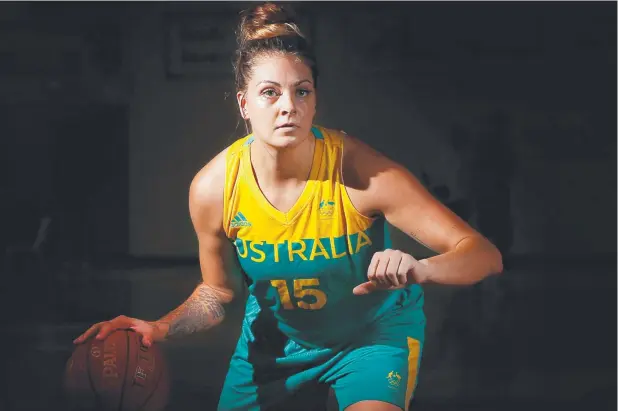  ?? Picture: BRENDAN RADKE ?? ON MOVE: Cayla George, Australian women's basketball gold medallist at the Commonweal­th Games, is off to Dallas, Texas.