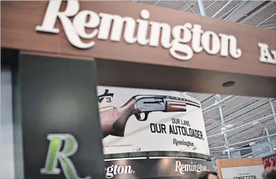  ?? BLOOMBERG FILE PHOTO ?? Remington promotes its guns at the National Rifle Associatio­n annual meetings and exhibits in 2015.