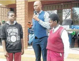  ?? /SUPPLIED ?? PSL referee Victor Hlungwani speaking at Vuswayi Secondary School at Madonsi village, Limpopo.