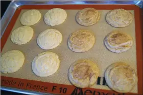  ?? PHOTO BY EMILY RYAN ?? For consistent cookies, use a portion scoop and silicone baking mat or parchment.