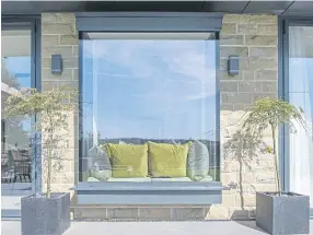  ?? ?? Plants can be placed outside a bay window (photo: Express Bi-Folding Doors)