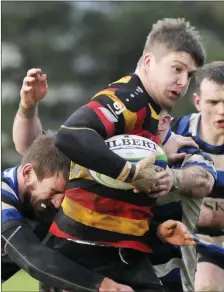  ??  ?? Mike Wells carries for Sligo.