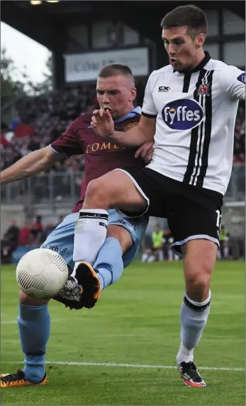  ??  ?? Patrick McEleney gets a touch on the ball ahead of Galway United’s Stephen Walsh.