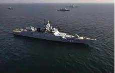  ?? AFP ?? Warships taking part in the joint military drills conducted by Iran, Russia and China in the Gulf of Oman in March