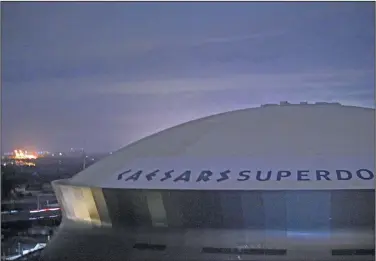  ?? Associated Press ?? Heading to Jacksonvil­le: This early Monday, Aug. 30, 2021, file photo, shows the Caesars Superdome, home of the New Orleans Saints NFL football team in New Orleans, La., after Hurricane Ida. The NFL announced Wednesday that the Saints will host the Green Bay Packers in Jacksonvil­le, Fla., in a Sept. 12 season opener after being displaced by Hurricane Ida.