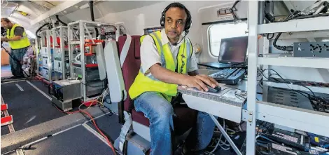  ?? Supplied ?? Air pollution expert Mengistu Wolde of the National Research Council monitors data collected during an oilsands flight.