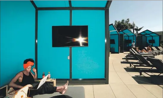  ?? Photograph­s by Genaro Molina Los Angeles Times ?? POOLSIDE CABANAS were custom-designed for the $500-million Circa complex in downtown L.A. Each is worth as much as a car, landlord Scott Dobbins said.