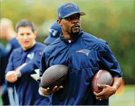  ?? ELSA / GETTY IMAGES / TNS ?? TheMiami Dolphins are expected to hire Brian Flores, the linebacker coach of the New England Patriots, as head coach after his teamis out of the playoffffs.