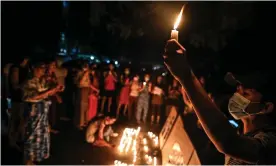  ?? Photograph: Ye Aung Thu/AFP/Getty Images ?? Protesters hold a ceremony to pray for those who died during demonstrat­ions in Yangon.