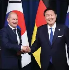  ?? Photo: Reuters ?? German Chancellor Olaf Scholz, (left), with South Korean President Yoon Suk Yeol.