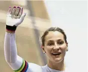  ?? — AP ?? Victorious: Germany’s Kristina Vogel waving to the crowd after winning the women’s keirin final in the UCI Track World Cup on Saturday.