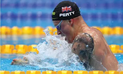  ??  ?? Adam Peaty competes in the men’s 100m breaststro­ke final on day one of the British trials at the London Aquatics Centre. Photograph: Clive Rose/Getty Images