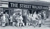  ??  ?? Children line up outside Wellington’s first purpose-built cinema, Kings Theatre in Dixon Street, in August 1978. Despite appearance­s the youngsters were not going to see R20 film The Street Walker, but rather children’s film The Storm Boy.