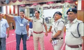  ?? ANI ?? Police personnel and election officials outside a counting centre in Panipat on Wednesday.