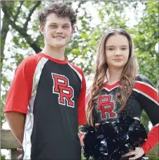  ?? TIMES photograph by Annette Beard ?? Junior Nate Graham and senior Chloe Henson are the captains of this year’s varsity Blackhawk cheer squad.