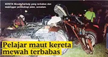  ??  ?? KERETA Nissan Fairlady yang terbabas dan melanggar pembahagi jalan, semalam.