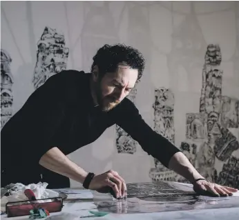  ?? Photos Tabari Artspace ?? Kevork Mourad’s creative process includes smudging ink on to a transparen­t sheet of acetate, then drawing calligraph­ic strokes in the liquid and pressing the sheet on to fabric