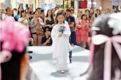  ?? Agence France-presse ?? A child model parading on the catwalk at a child model contest in Beijing.