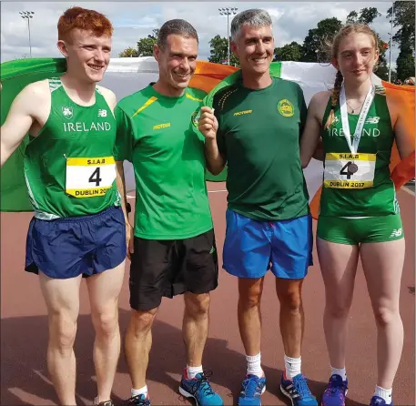  ??  ?? Ruarcan O Gibne and Tara Meier with their coaches Liam Cooney and Colin McHugh.