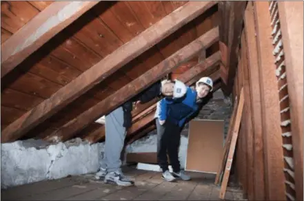  ?? SUBMITTED PHOTOS ?? Kennett High School students check out the upper floor of a house during an educationa­l tour that showed them them how houses are constructe­d.