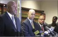  ?? FRANK ELTMAN — THE ASSOCIATED PRESS ?? United States Attorney Robert Capers, left, and the FBI’s William Sweeney, Jr., second left, announce the indictment of Nassau County Executive Edward Mangano, his wife Linda Mangano, and Oyster Bay Town Supervisor John Venditto, Thursday, Oct. 20,...