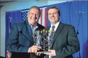  ??  ?? Michael Dzik (left side), executive director of the Jewish Federation of Greater Chattanoog­a. He is giving the award. Pastor Bret Yaeger (right side), pastor of Temple Baptist Church, Dalton, Georgia. He is receiving the Khilla Award.