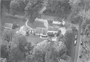  ?? Associated Press ?? ■ This photo, above, taken from video shows an aerial view of residences and buildings on the property of George Soros, below, in Katonah, N.Y. A bomb was found in a mailbox at the suburban New York home of the liberal billionair­e philanthro­pist who has been vilified by right-wing conspiracy theorists, authoritie­s said Tuesday.
