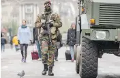  ?? GEERT VANDEN WIJNGAERT / THE ASSOCIATED PRESS ?? While Brussels was kept on the highest of four alert levels, the rest of the country remains on a Level 3 alert,
meaning an attack is “possible and likely.”