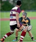  ??  ?? Rodrigo Costa is challenged by Waitakere`s Benjamin Stowers on July 16.