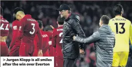  ??  ?? &gt; Jurgen Klopp is all smiles after the win over Everton