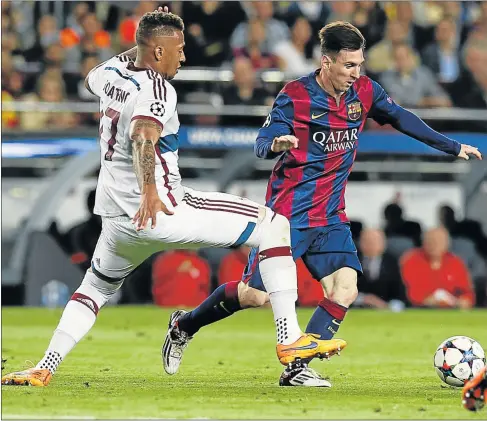  ?? Picture: REUTERS ?? MASTER AT WORK: Barcelona’s Lionel Messi, right, weaves past Bayern Munich’s Jerome Boateng in the Uefa Champions League semifinal first leg at the Camp Nou stadium in Barcelona on Wednesday night. The young Spaniard maestro was at his brilliant best...