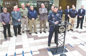  ?? STAFF PHOTO BY TIM BARBER ?? In the lobby of the Hamilton County-Chattanoog­a Courts Building Wednesday, Chattanoog­a Police Chief David Roddy speaks about the Hamilton County Grand Jury decision to indict 54 gang members utilizing the RICO Act.