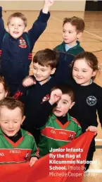  ?? Photo by Michelle Cooper Galvin ?? Junior Infants fly the flag at Kilcummin National School.